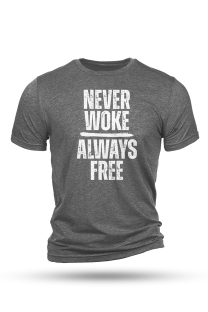 Gray t-shirt with white text 'NEVER WOKE ALWAYS FREE' on a white background